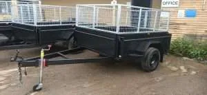 mmexport1609287590389 scaled December 8, 2023 | 9x5 Deluxe Galvanised Full Checker Plate 2000 kg Capacity Tandem Trailer with High Sides and Cage